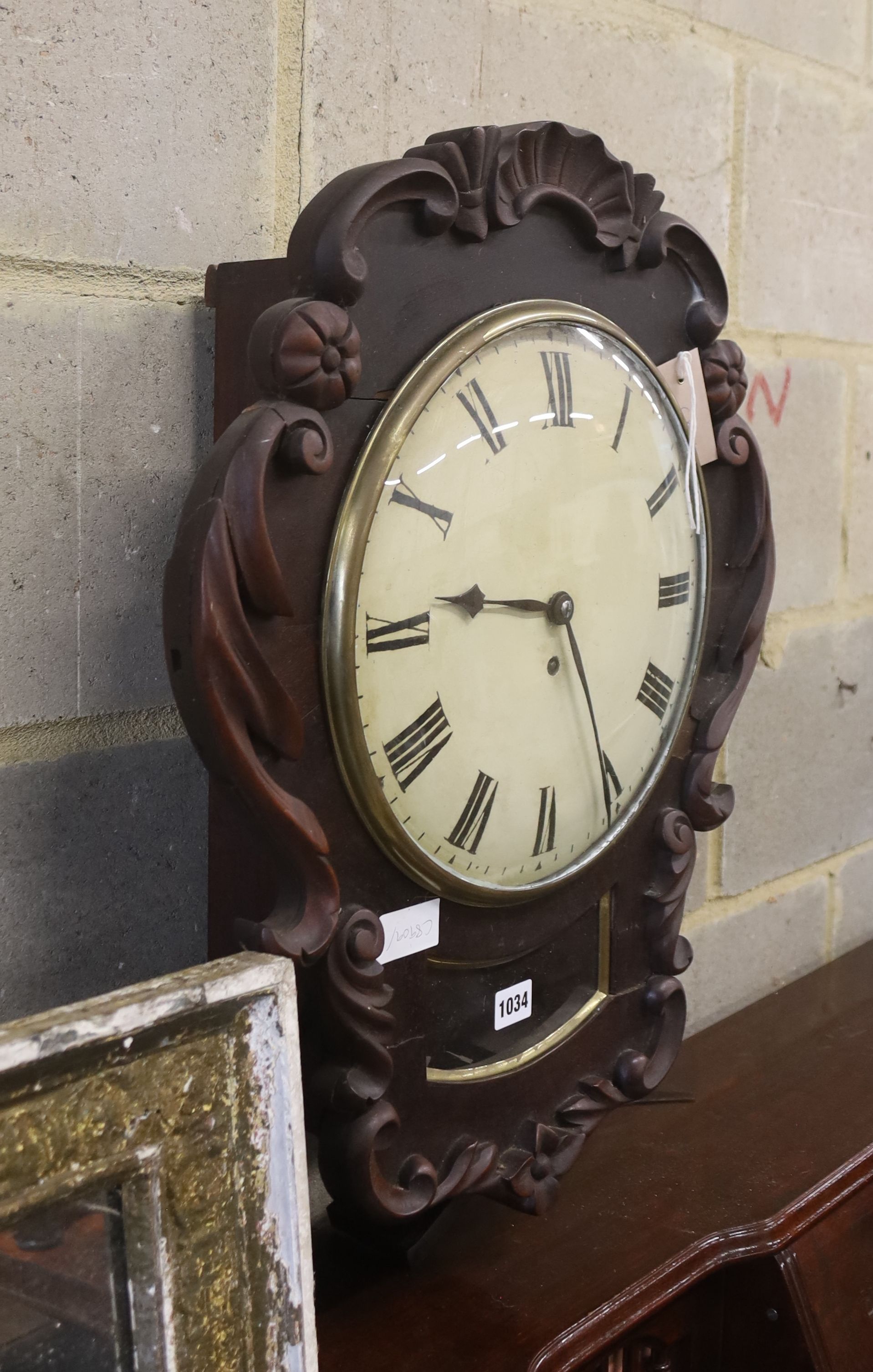 A William IV mahogany wall timepiece, width 46cm, height 59cm